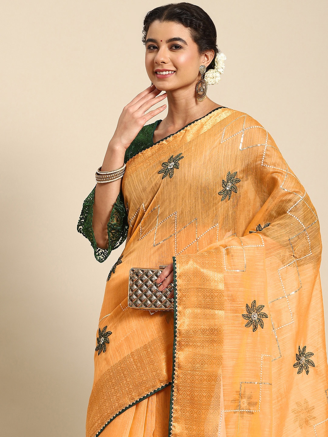 

Nimayaa Orange & Green Floral Embroidered Saree