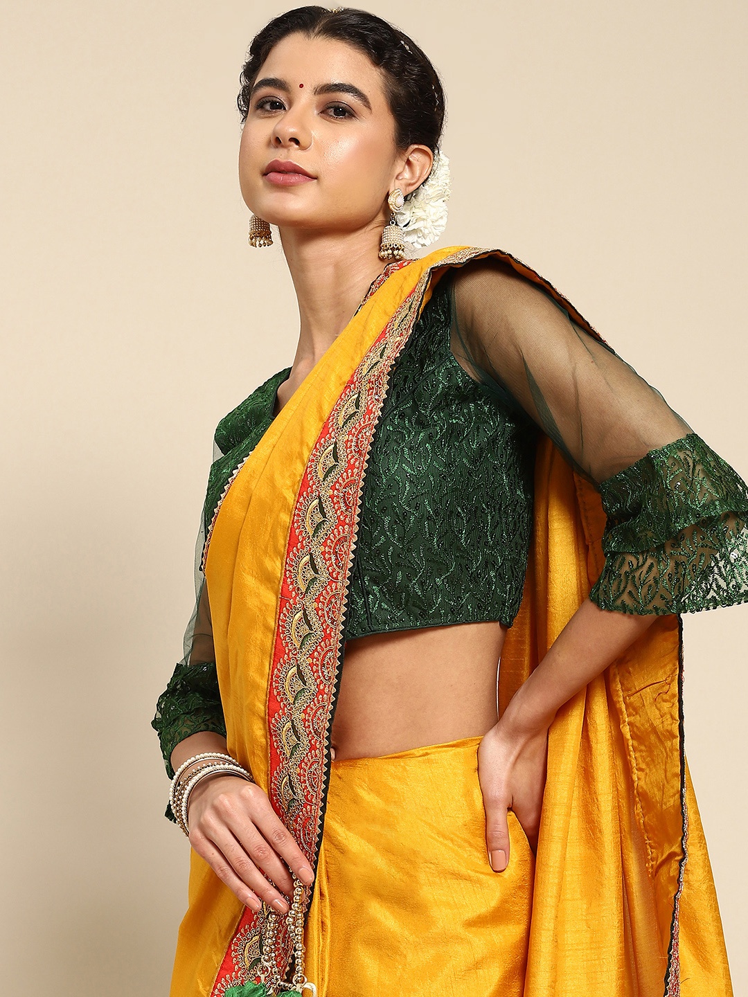 

Nimayaa Mustard Yellow Solid Embroidered Saree