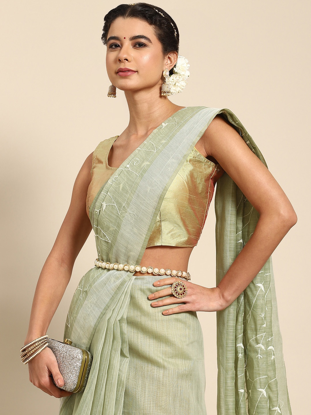 

Nimayaa Green Ethnic Motifs Embroidered Saree