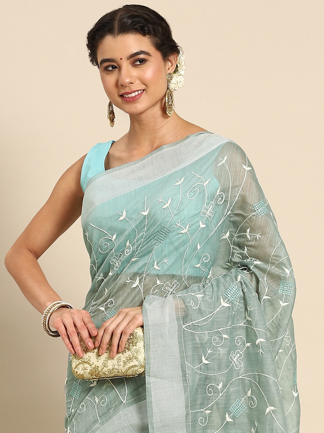 

Nimayaa Blue Ethnic Motifs Embroidered Saree