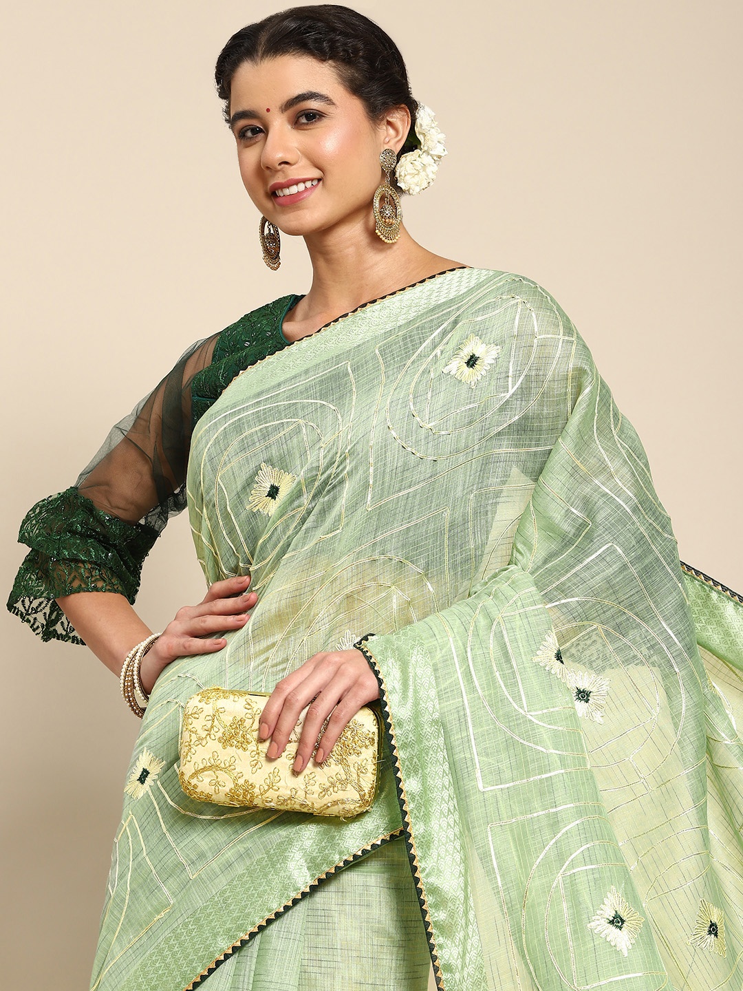 

Nimayaa Green Floral Embroidered Saree