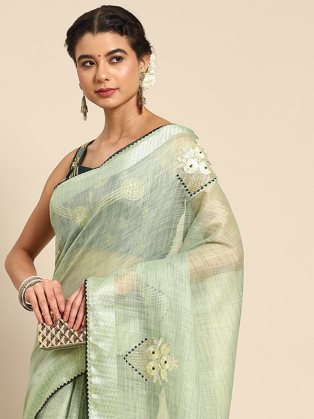 

Nimayaa Green Floral Embroidered Saree