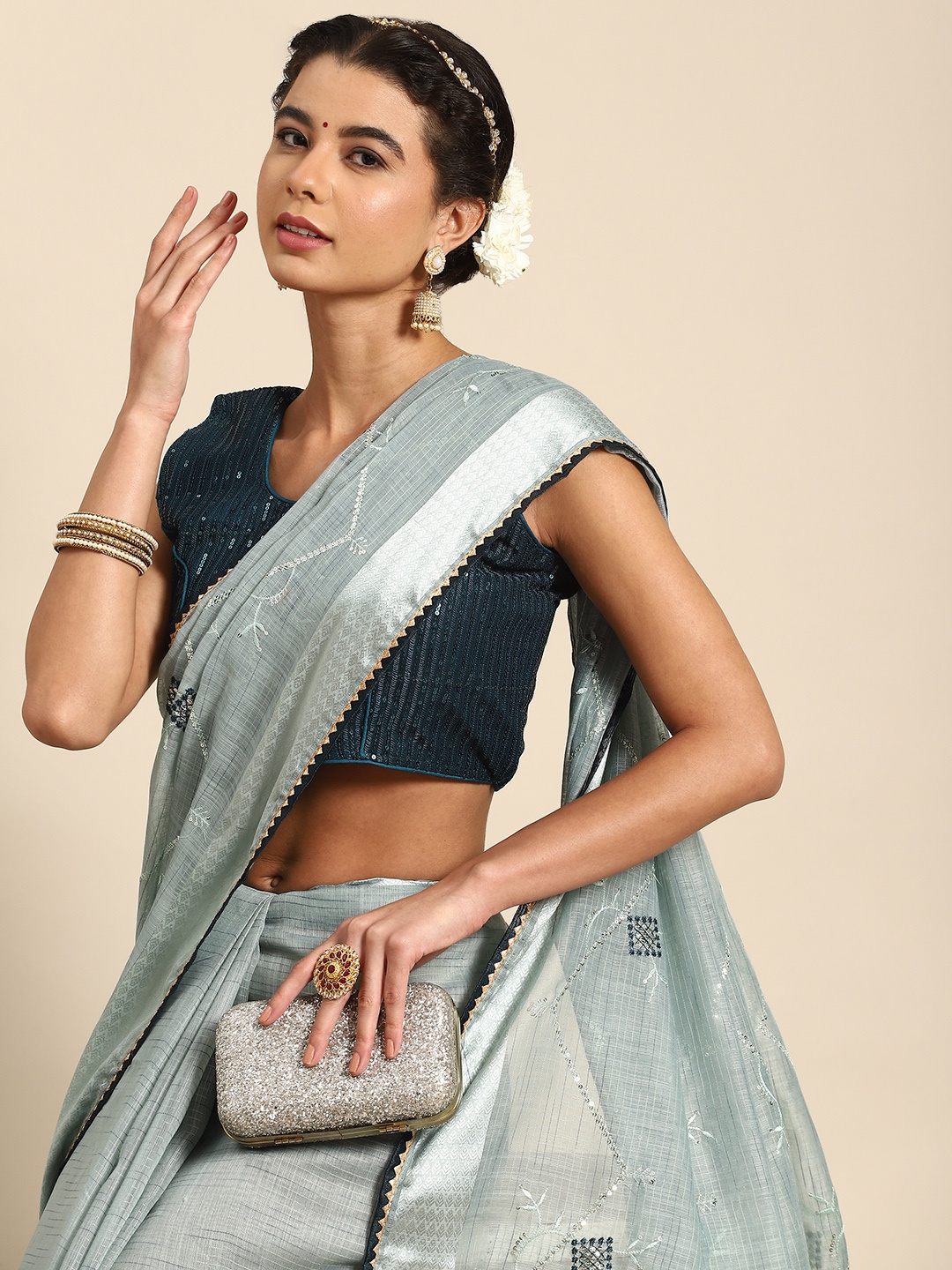 

Nimayaa Blue Ethnic Motifs Embroidered Saree