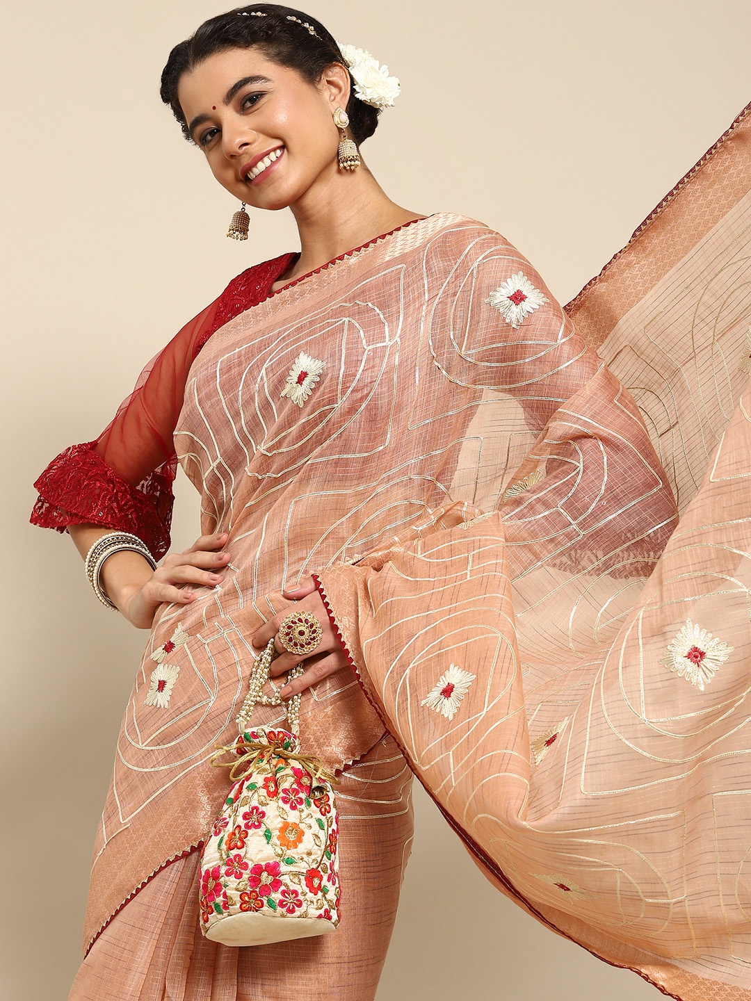 

Nimayaa Peach-Coloured Floral Embroidered Saree