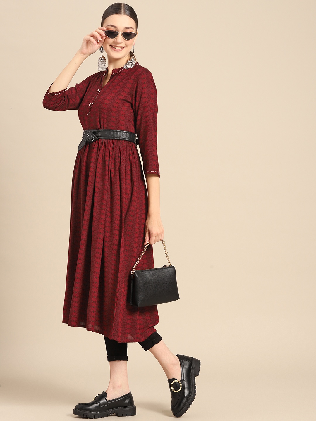 

Sangria Women Maroon Ethnic Motifs Printed Mandarin Collar Kurta