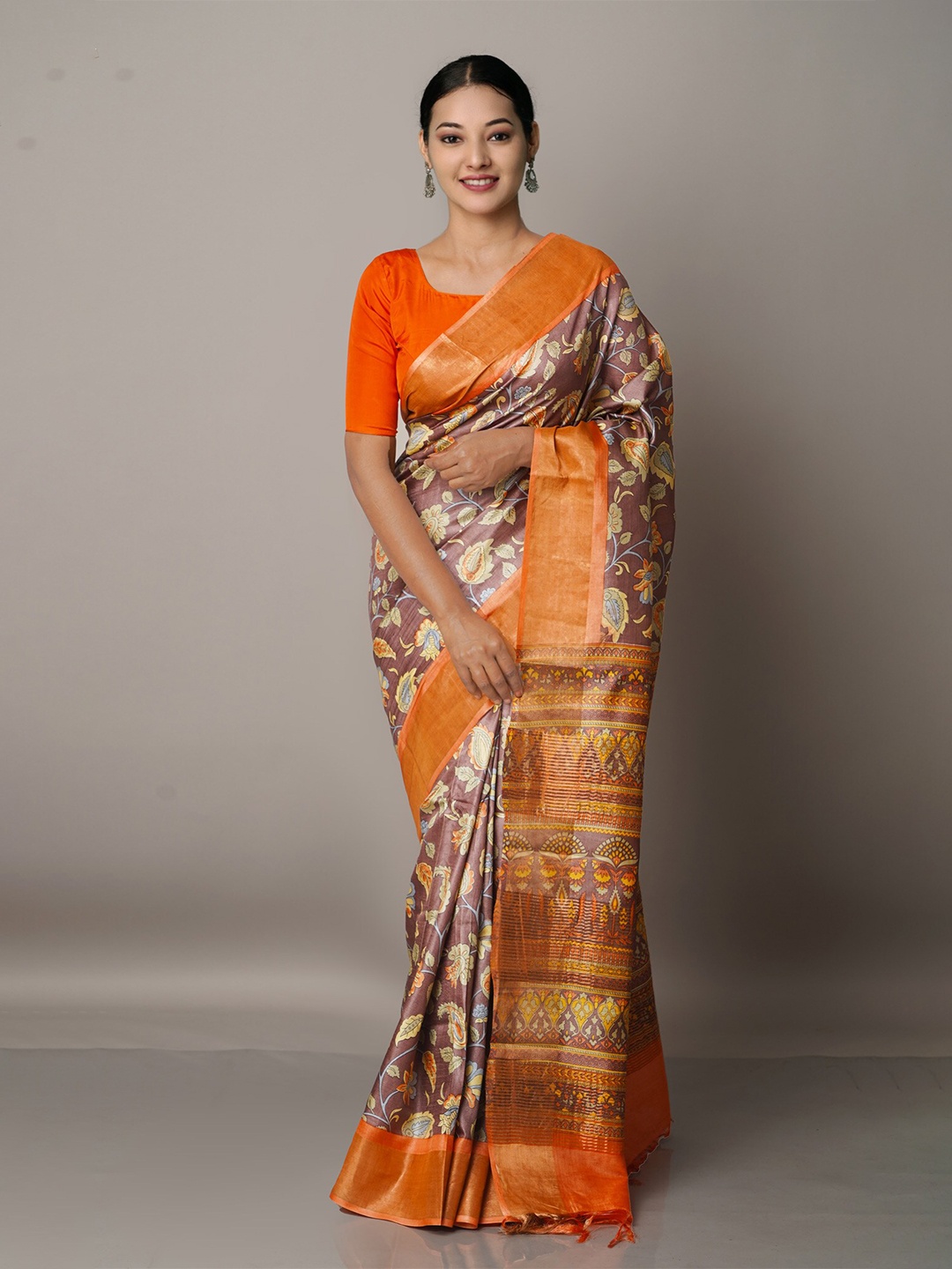 

Unnati Silks Brown & White Ethnic Motifs Zari Pure Silk Tussar Saree