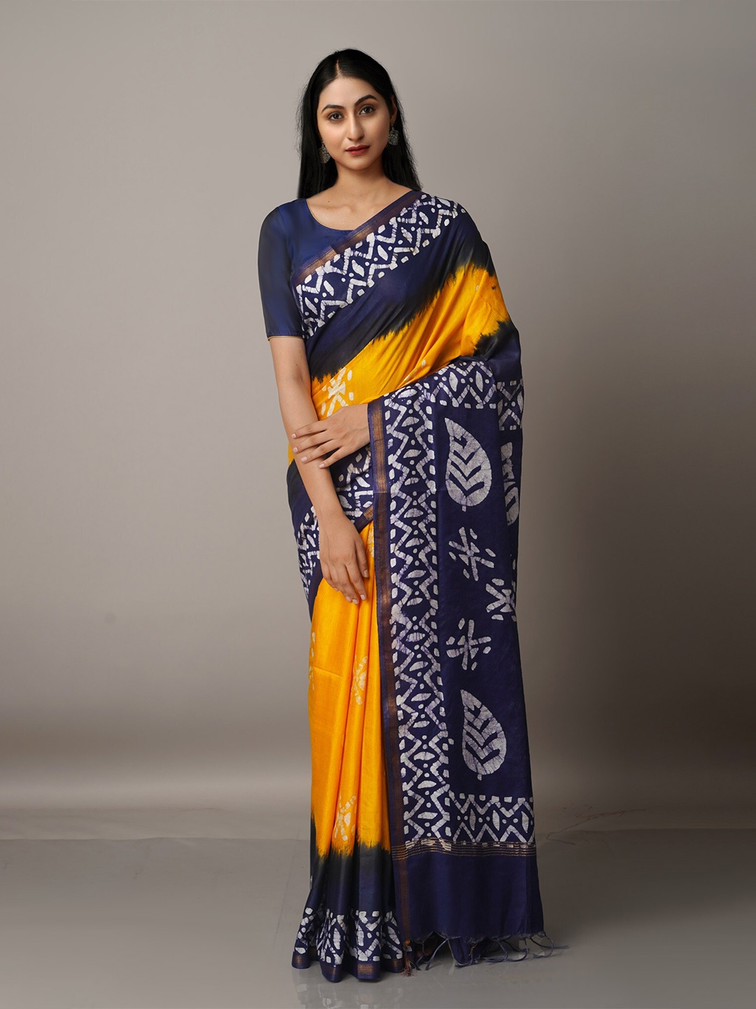 

Unnati Silks Yellow & Navy Blue Batik Zari Pure Silk Chanderi Saree