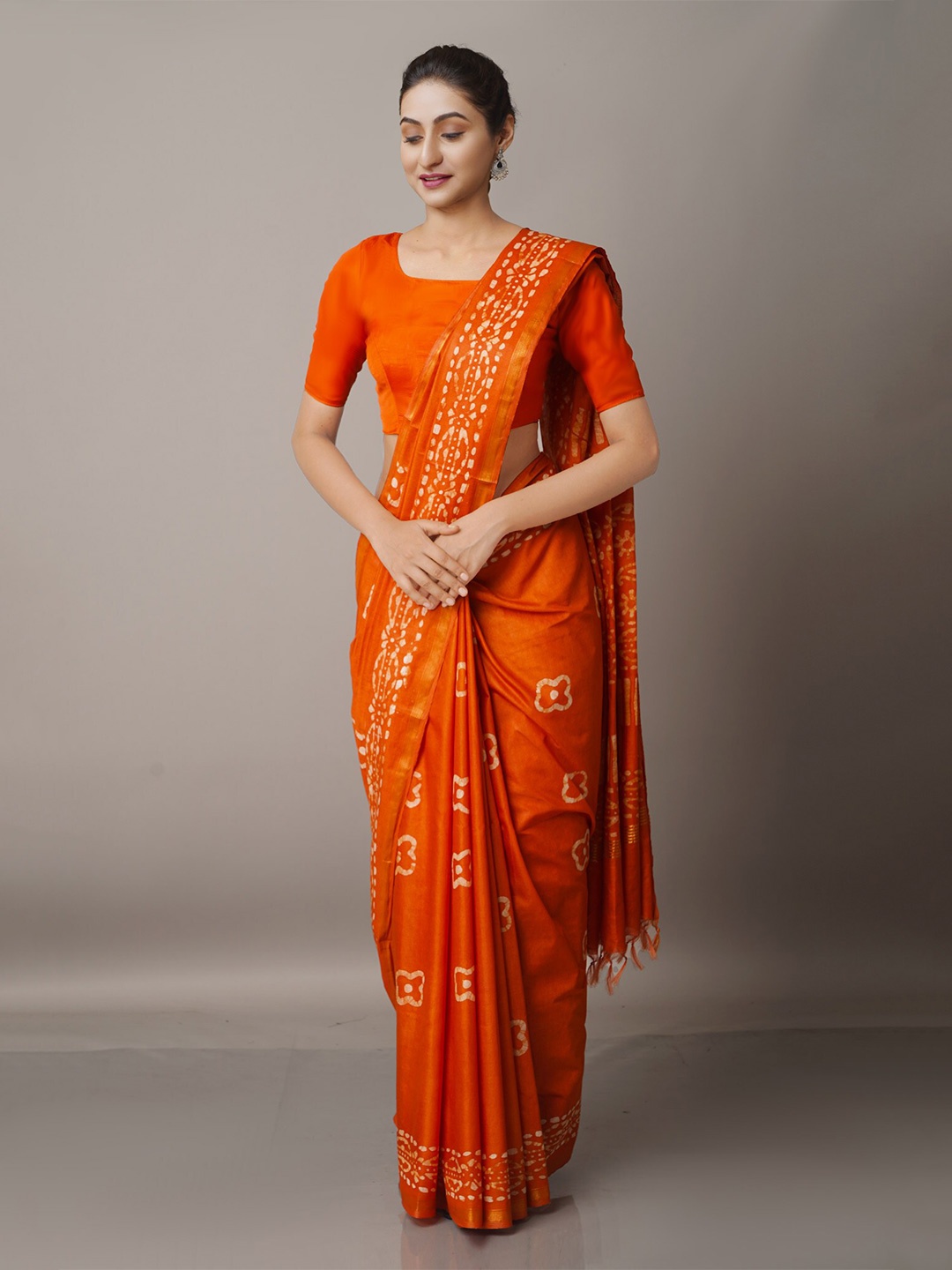 

Unnati Silks Orange & White Batik Zari Pure Silk Chanderi Saree