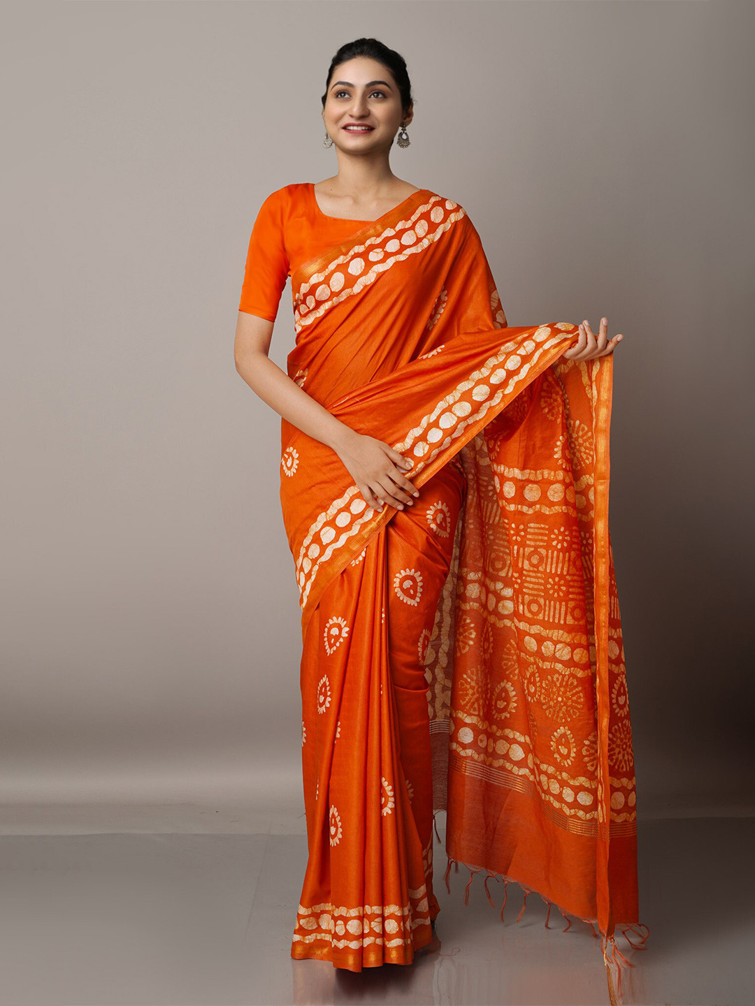 

Unnati Silks Orange & Gold-Toned Batik Zari Pure Silk Chanderi Saree