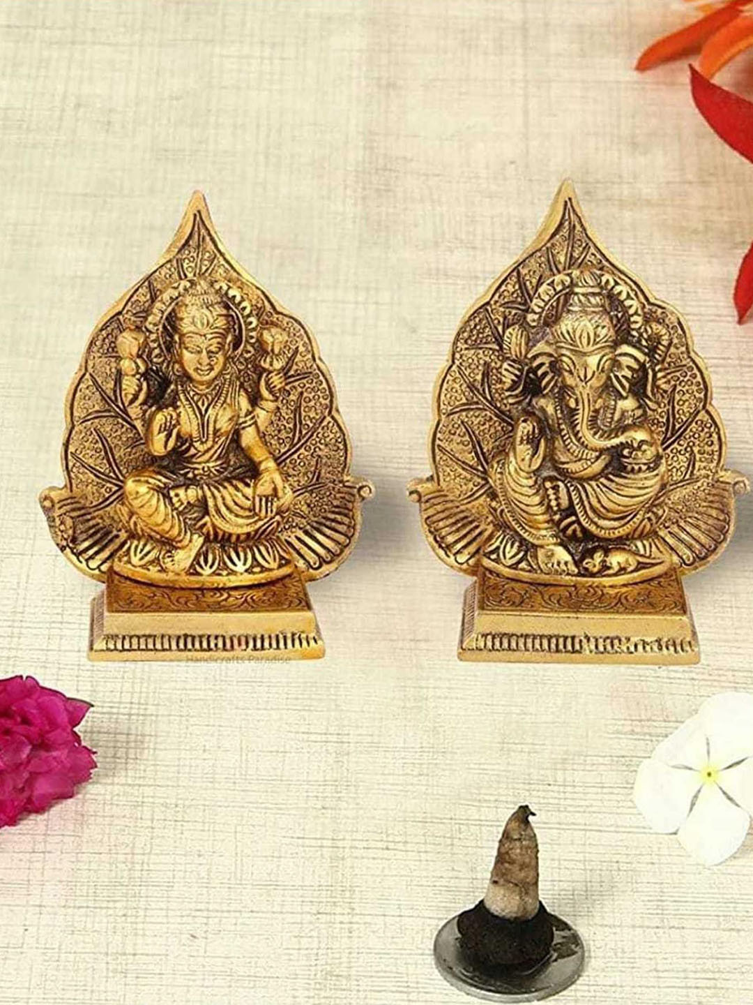 

Fashion Bizz Gold-Colored Designed Metal Showpieces