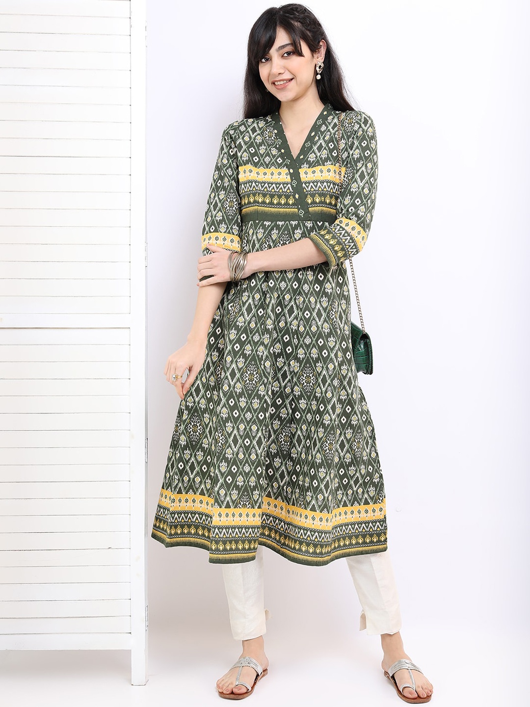 

Vishudh Women Green & Yellow Printed A-Line Kurta
