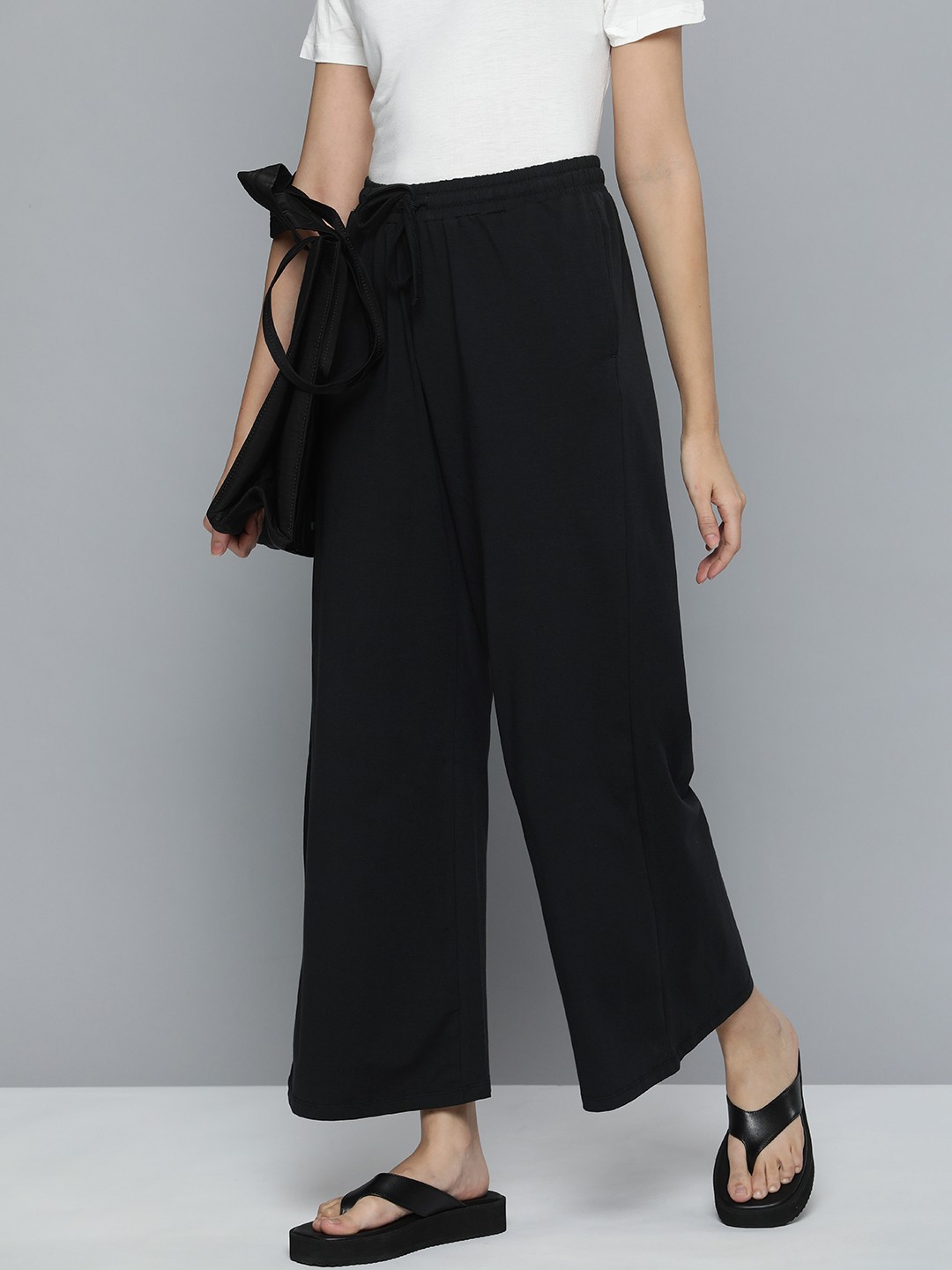 

Ether Women Black Solid Track Pants With Drawcords