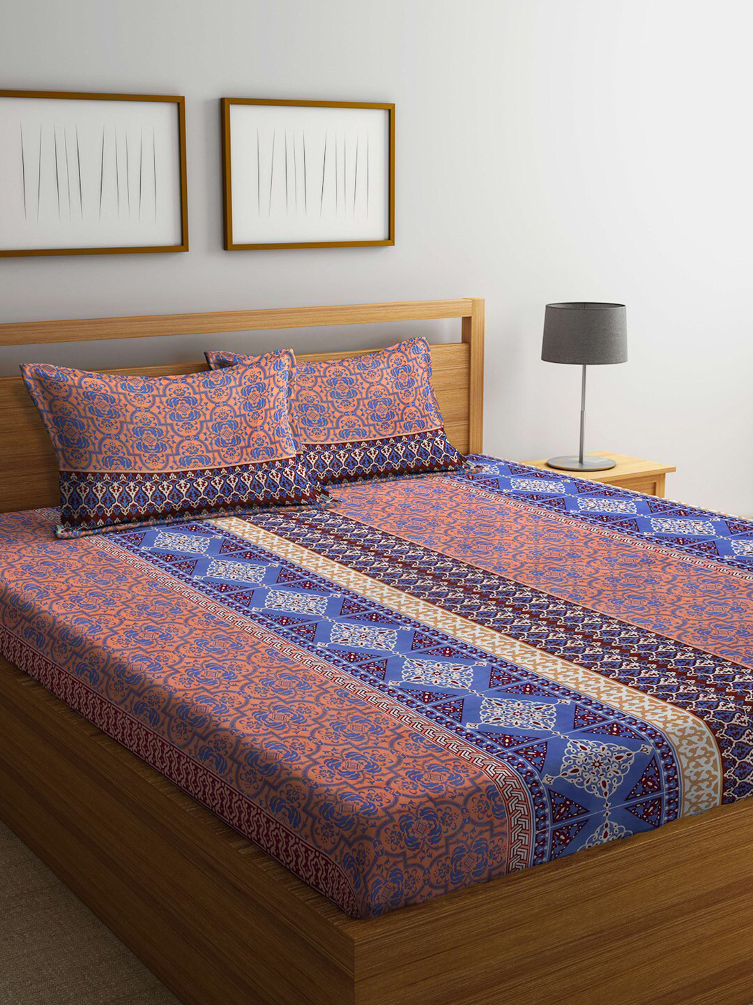 

Arrabi Blue & White Ethnic Motifs 300 TC King Bedsheet with 2 Pillow Covers