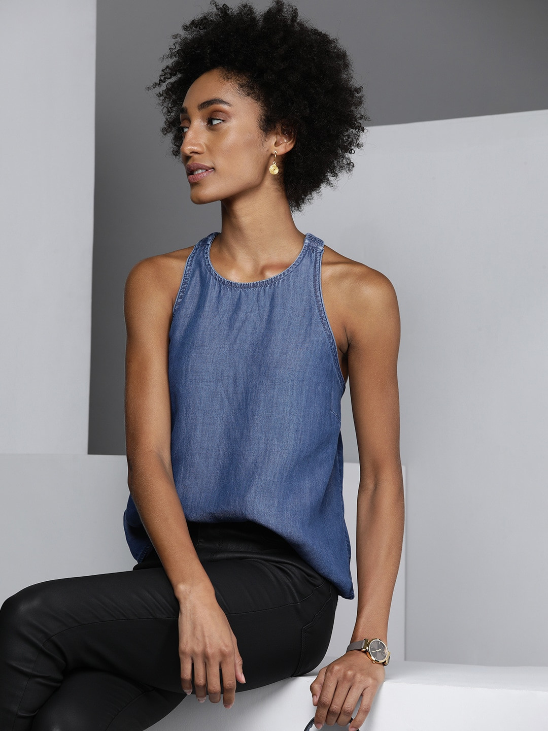 

Kenneth Cole Fluire Women Dark Blue Solid Sleevless Avant Moda Top With Styled Back