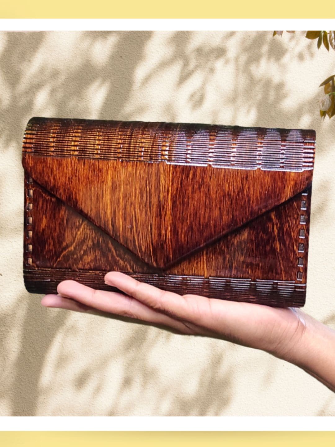 

scherico Brown Textured Envelope Clutch