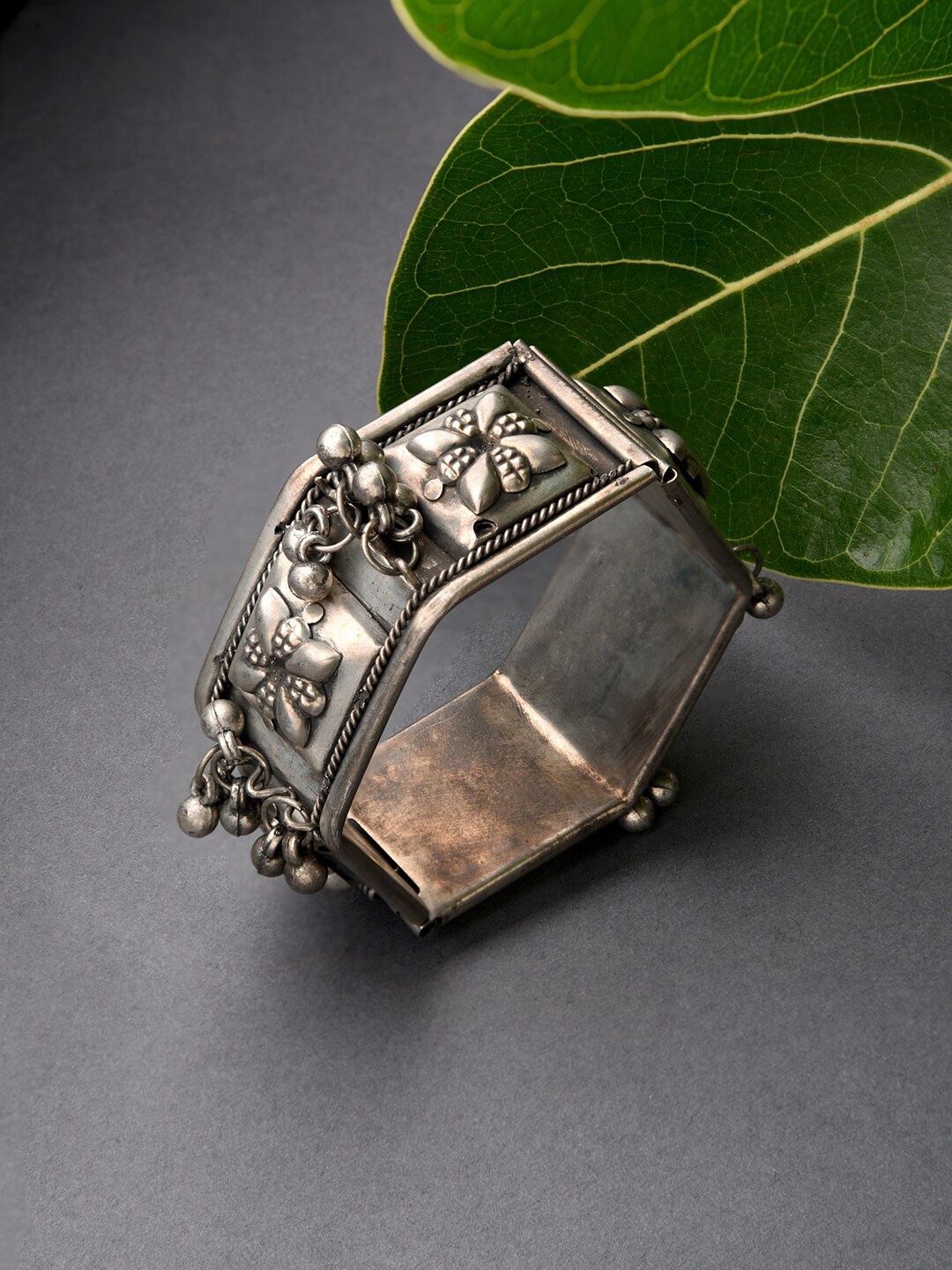 

Fida Silver-Plated & Toned Oxidised Floral Bangle