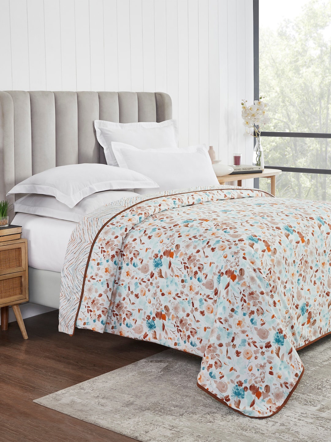 

Trident White & Maroon Floral AC Room Double Bed Dohar