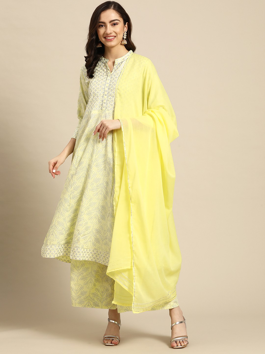

Sangria Women Yellow Ethnic Motifs Printed Flared Kurta with Palazzos & With Dupatta