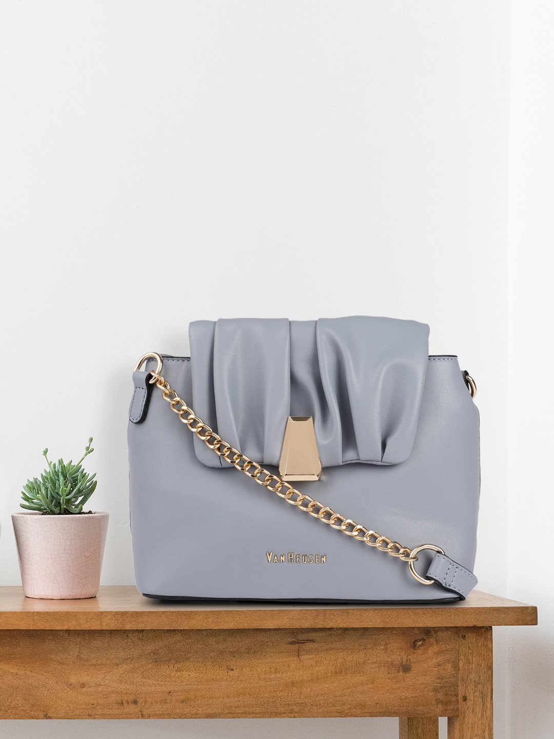 

Van Heusen Blue Solid Sling Bag