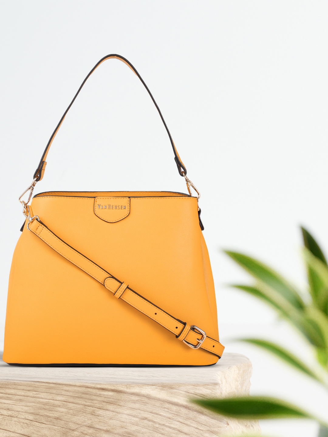 

Van Heusen Mustard Yellow Solid Structured Shoulder Bag