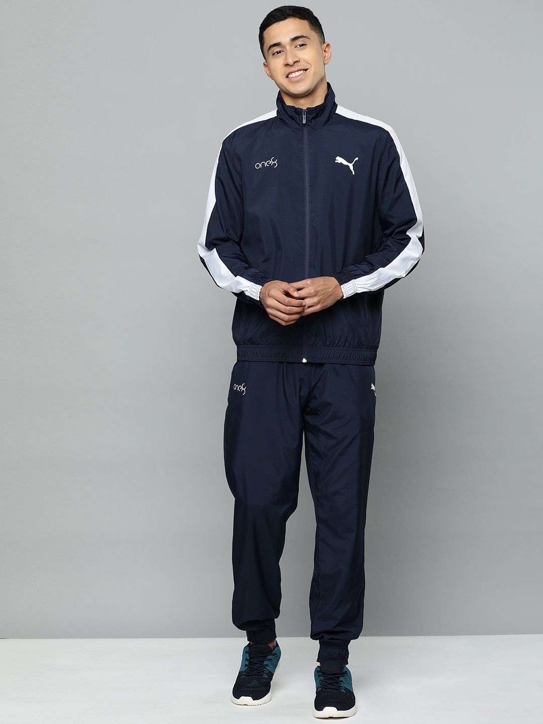 

one8 x PUMA Men Solid Regular Fit Track Suit, Blue