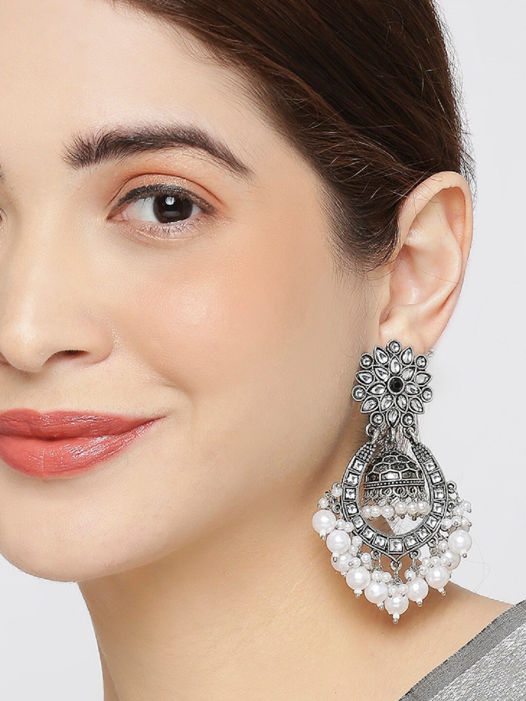 

OOMPH Silver-Plated Floral Jhumka Earrings