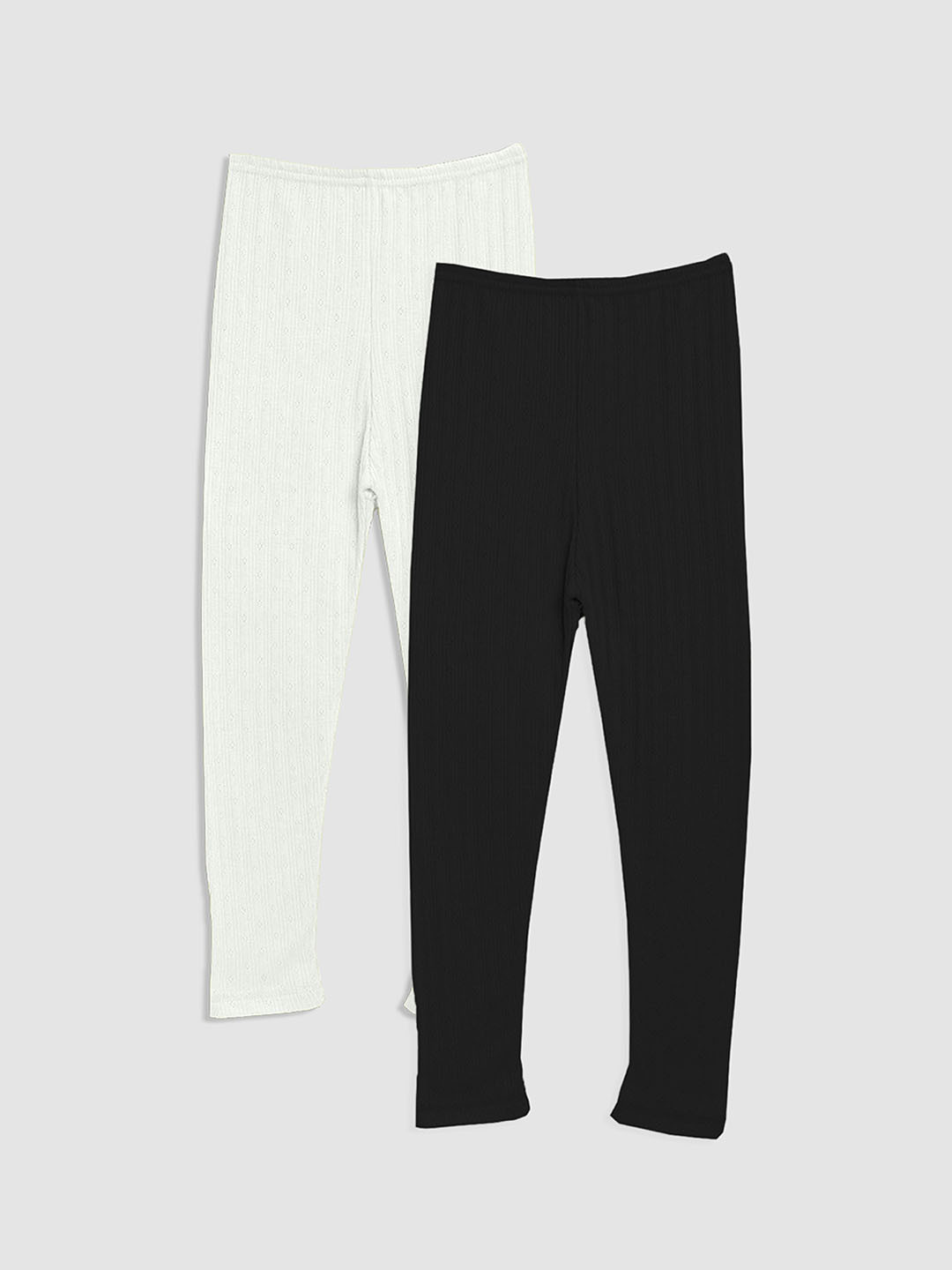 

Kanvin Girls Black & Off White Solid Thermal Bottoms