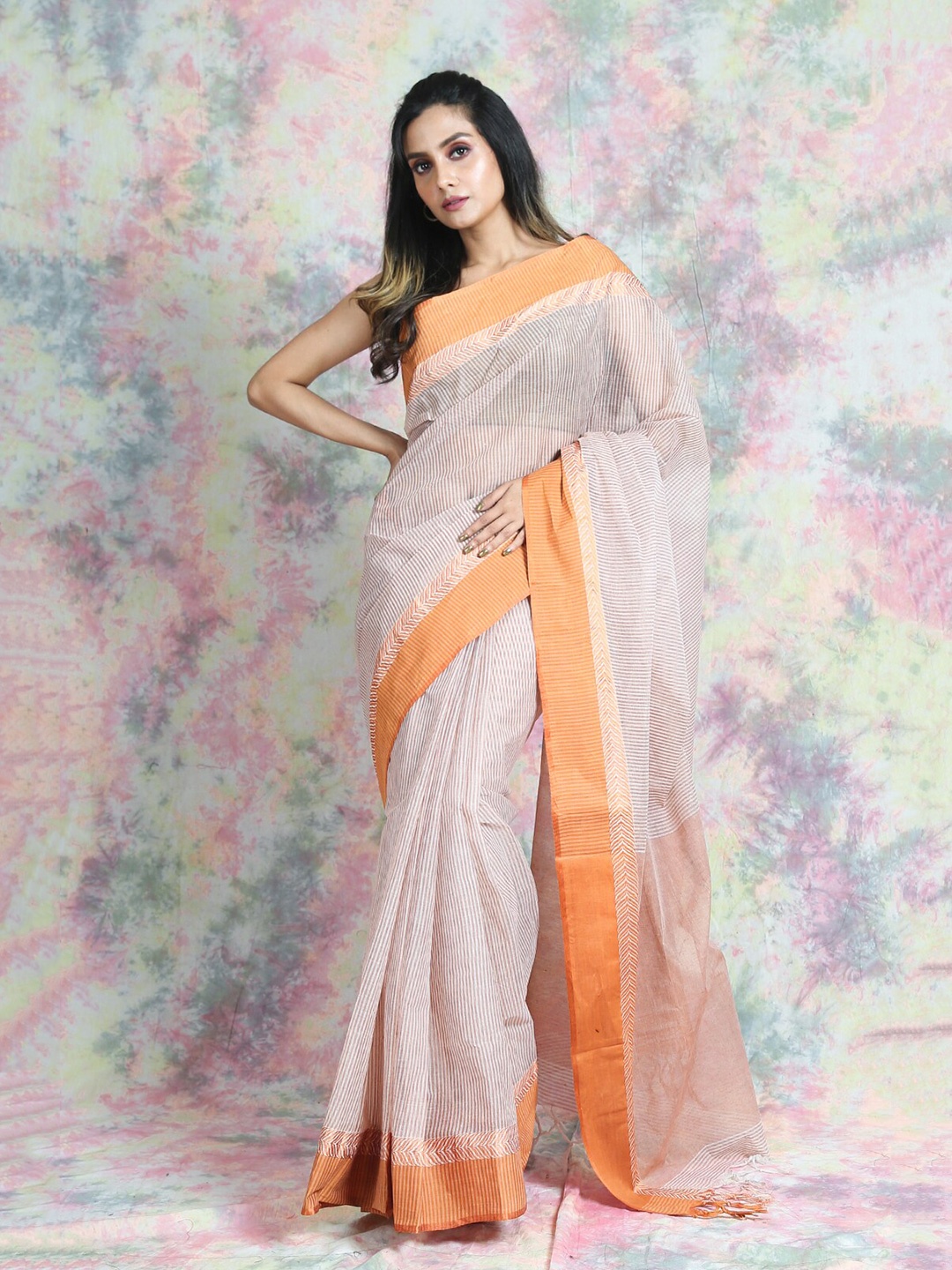 

Charukriti Off White & Mustard Striped Pure Cotton Taant Saree