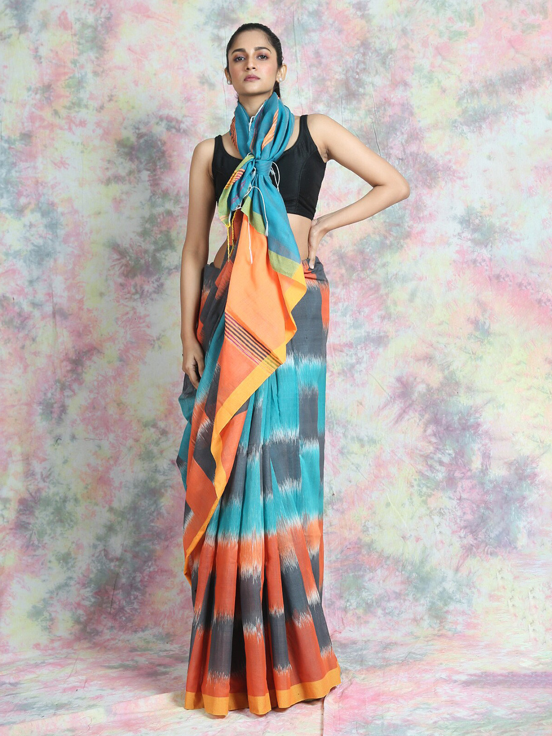 

Charukriti Grey & Blue Ikat Saree