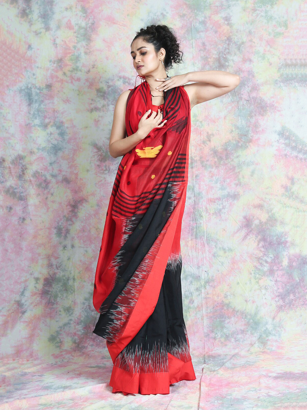 

Charukriti Red & Black Ikat Saree