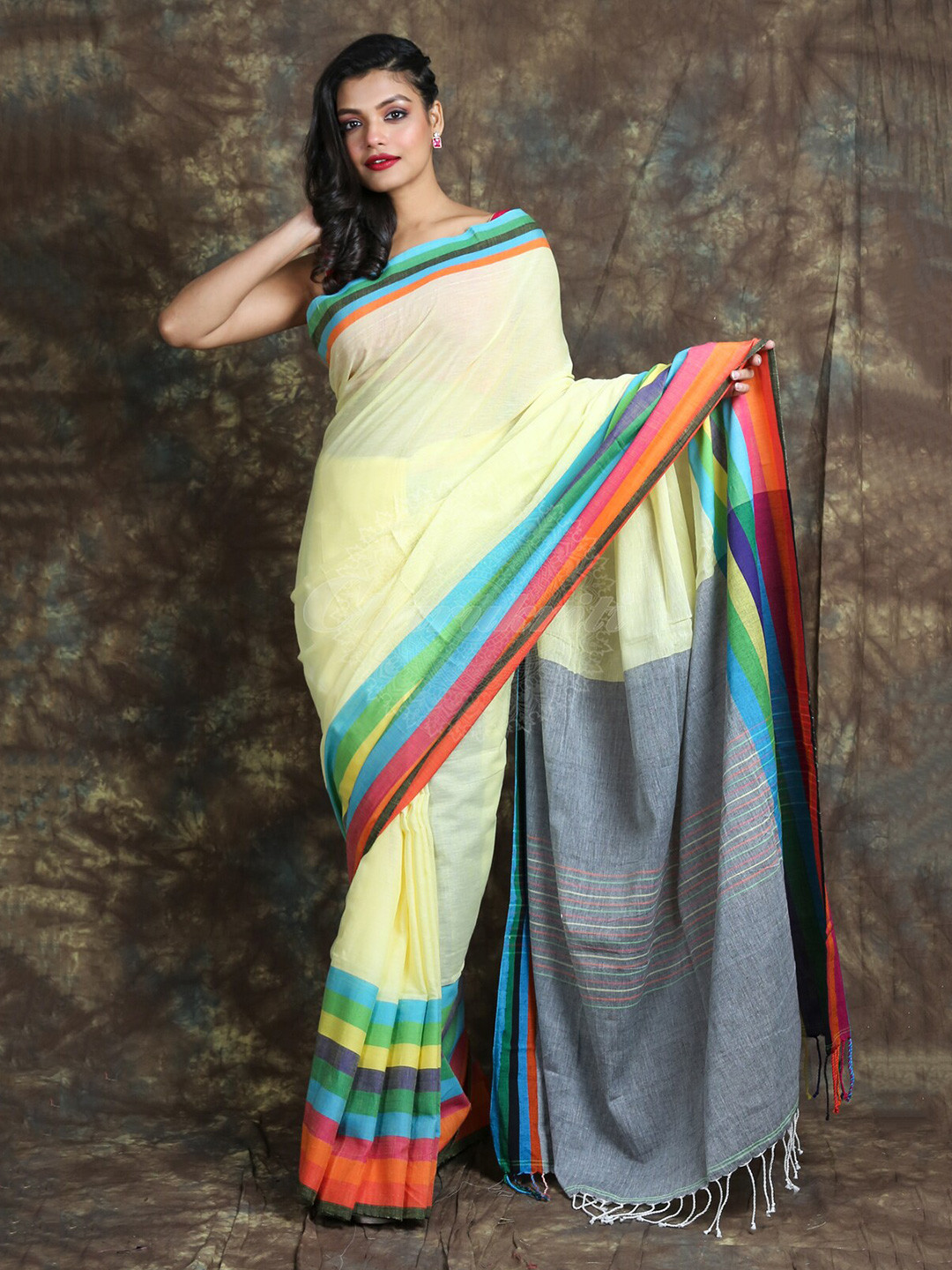 

Charukriti Yellow & Grey Pure Cotton Saree