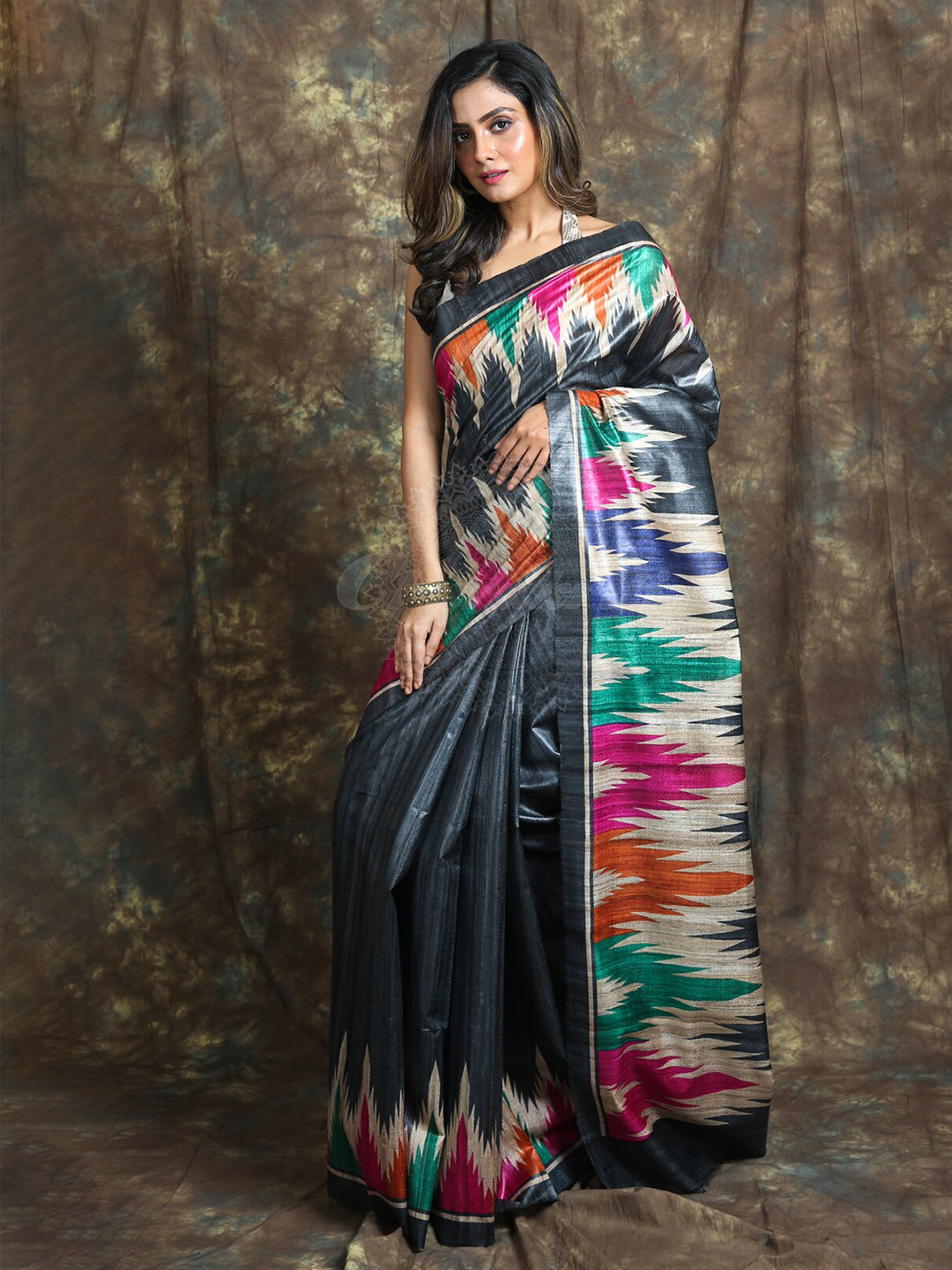 

Charukriti Black & Blue Pure Silk Saree