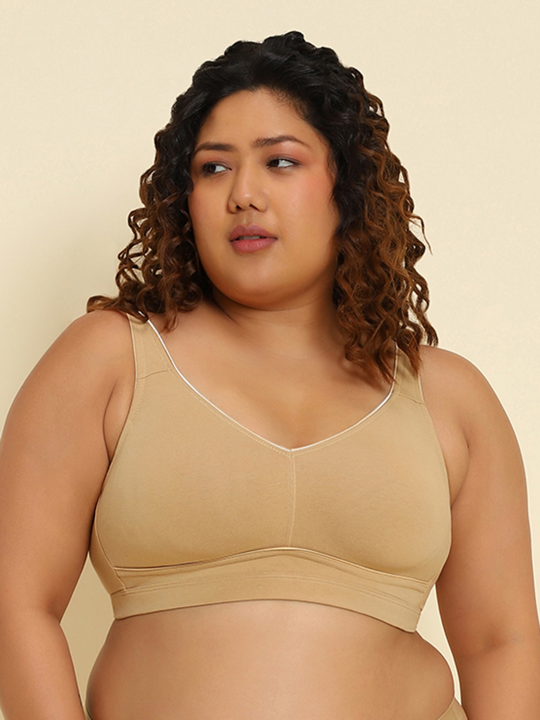 

Van Heusen Women Candied Ginger Solid Plus Size Wireless Minimizer Bra, Beige