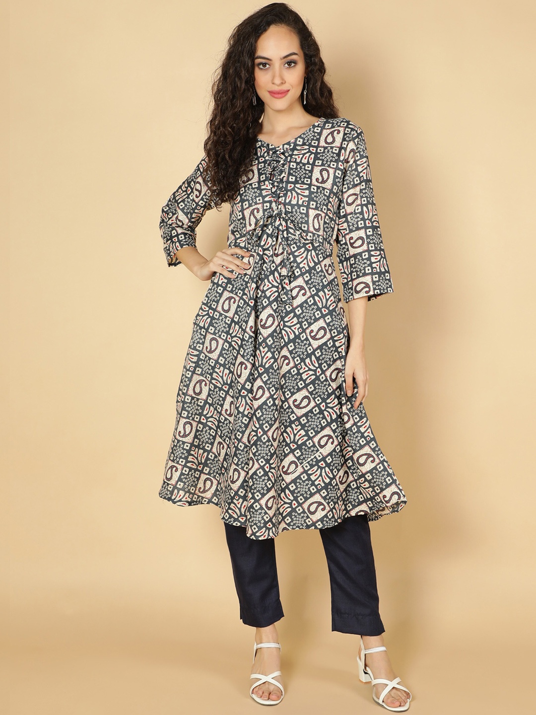 

Fabclub Women Navy Blue & Beige Ethnic Motifs Printed Thread Work Kurta