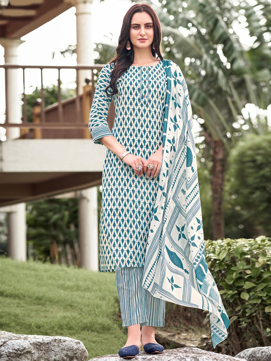 

Satrani Women Teal & Off White Printed Unstitched Dress Material