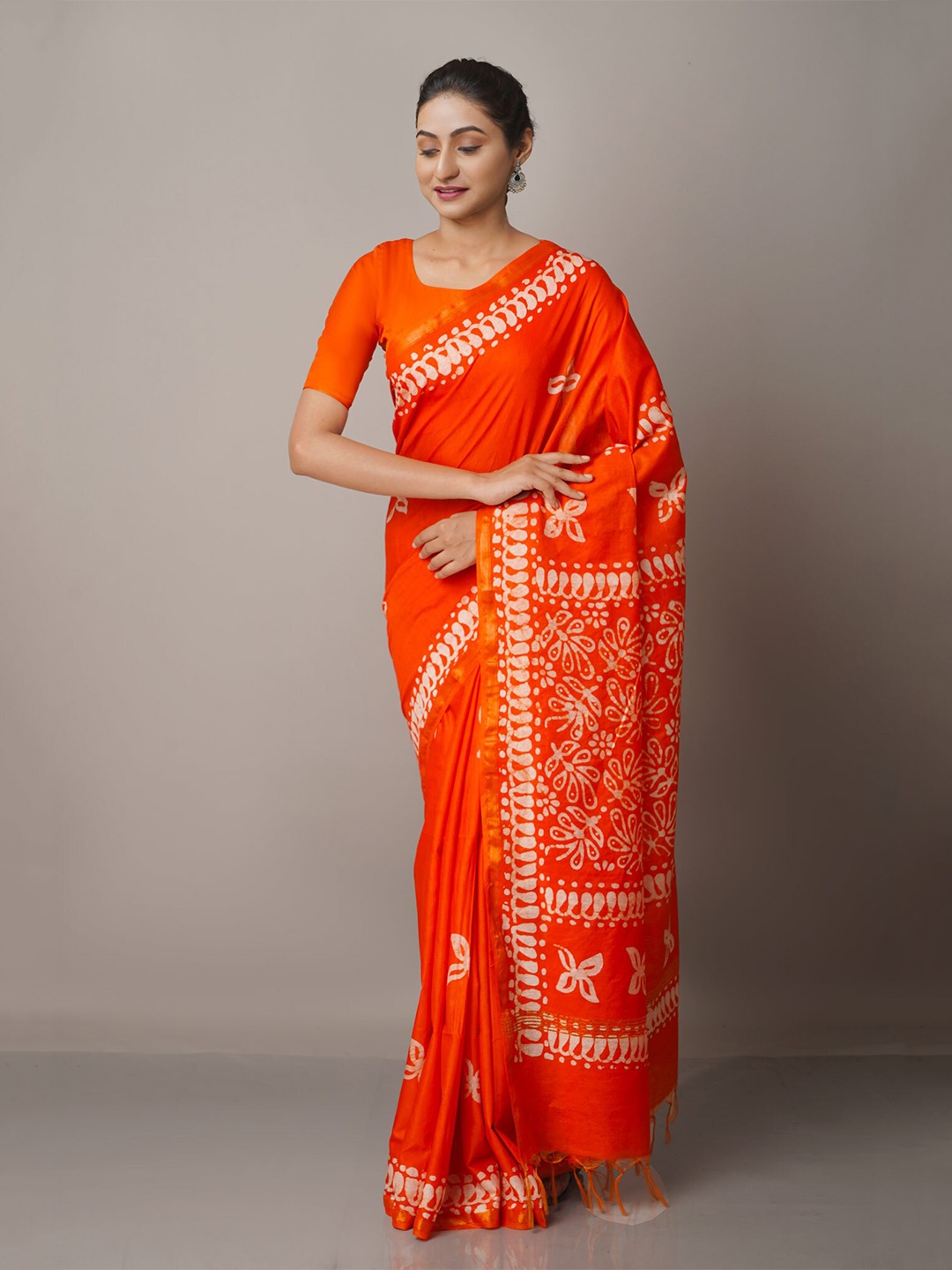 

Unnati Silks Orange & Gold Batik Zari Silk Blend Chanderi Saree