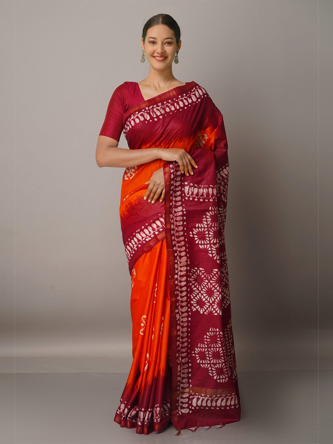 

Unnati Silks Orange & Gold Batik Zari Silk Blend Chanderi Saree