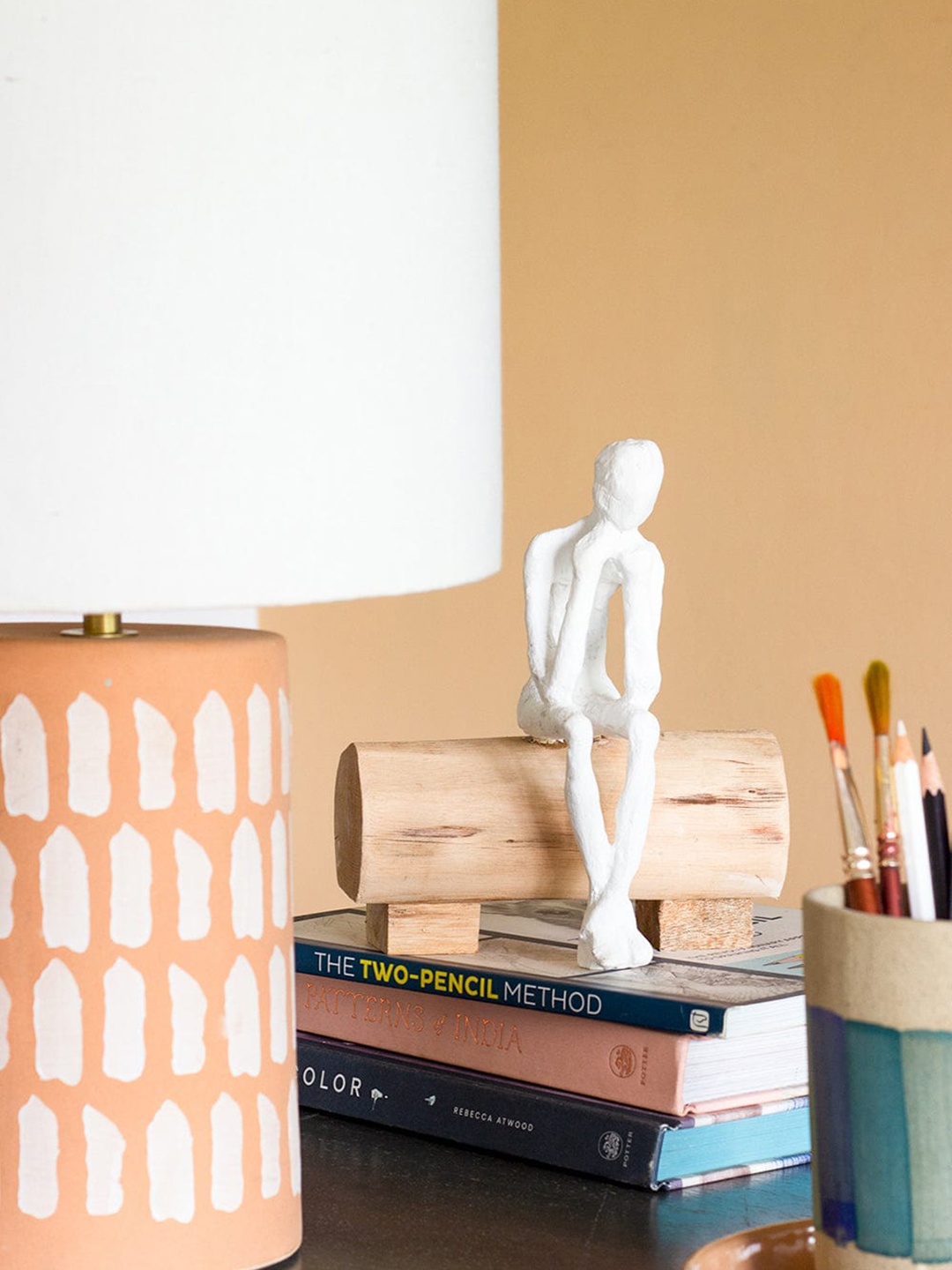 

The Wishing Chair White & Beige The Thinking Man Showpiece