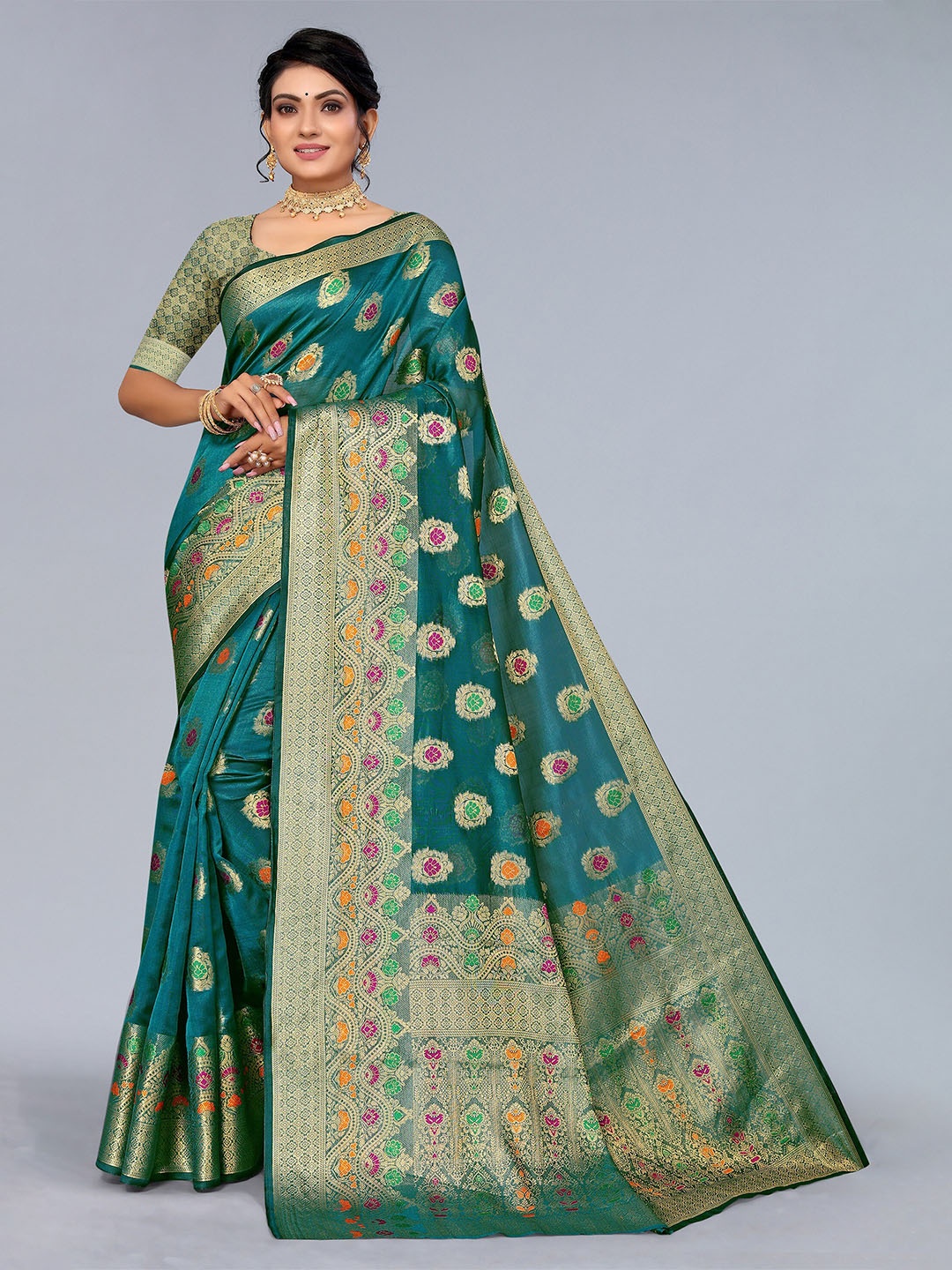 

Mitera Teal & Red Ethnic Motifs Zari Organza Saree