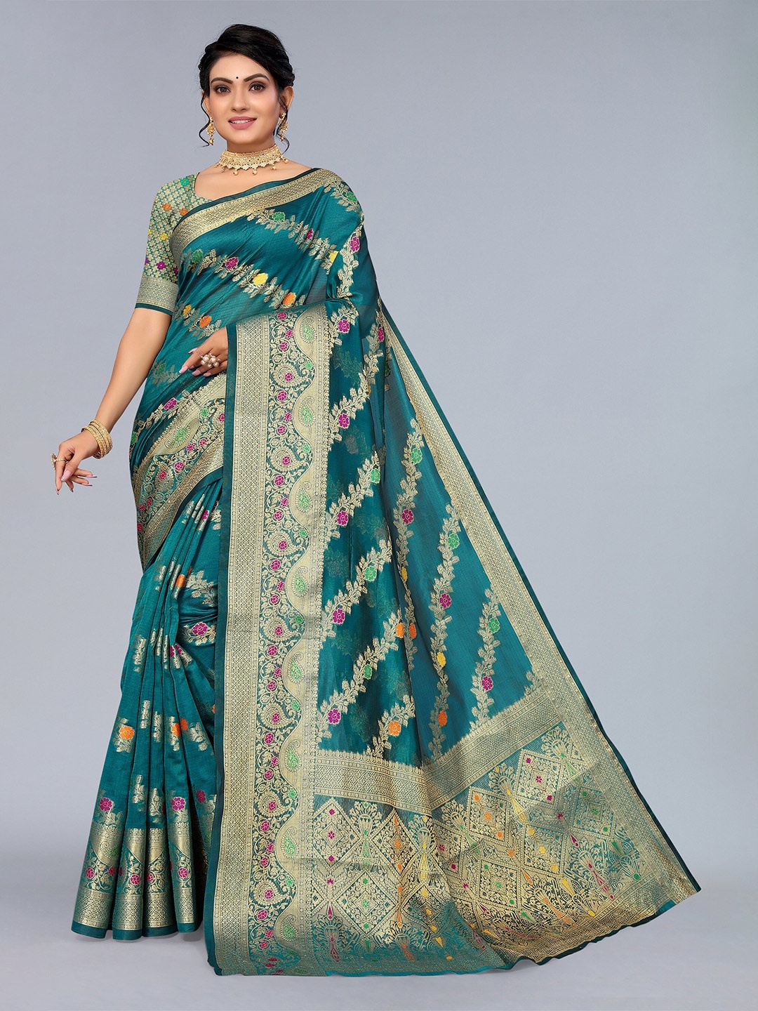 

Mitera Teal & Gold Ethnic Motifs Zari Organza Saree