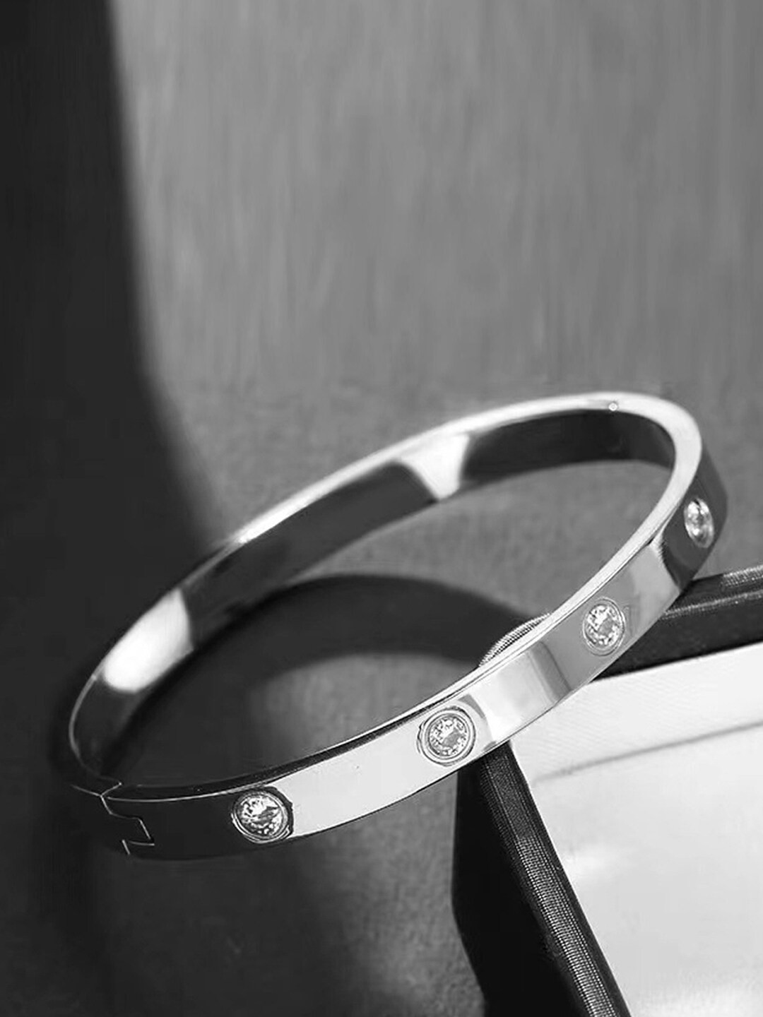 

Jewels Galaxy Women Silver-Toned American Diamond Silver-Plated Kada Bracelet