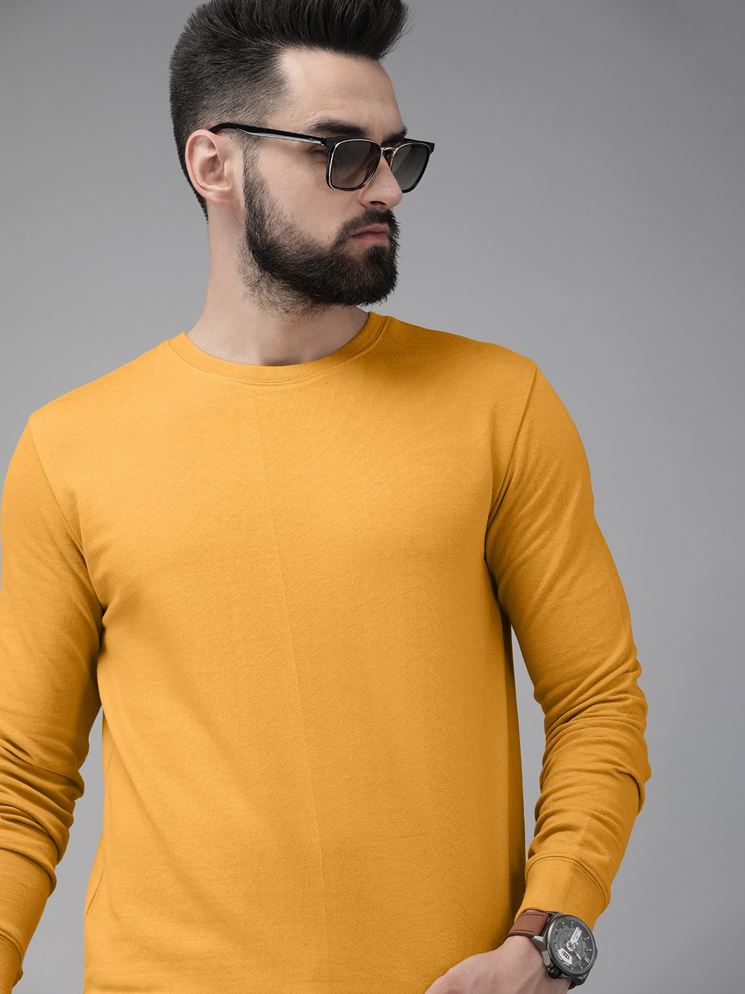 

Roadster Men Solid Sweatshirt, Yellow