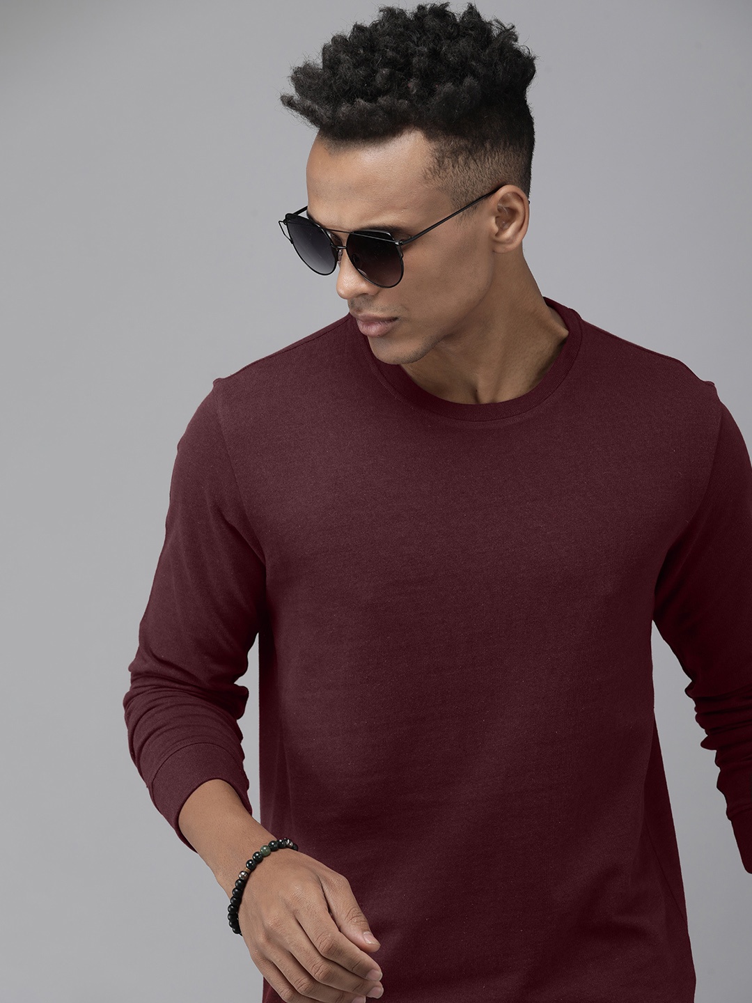 

Roadster Men Solid Sweatshirt, Burgundy