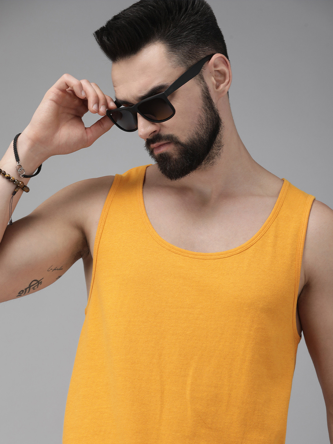 

Roadster Men Solid T-shirt, Yellow