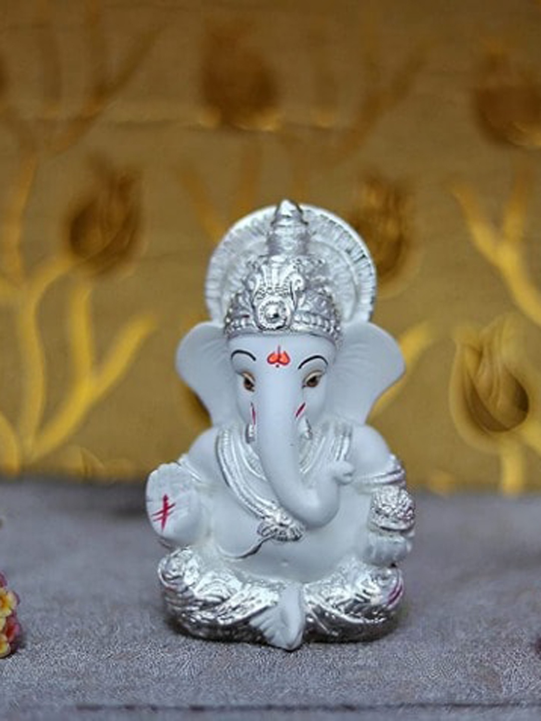 

Perpetual White Ganesha Idol Showpiece