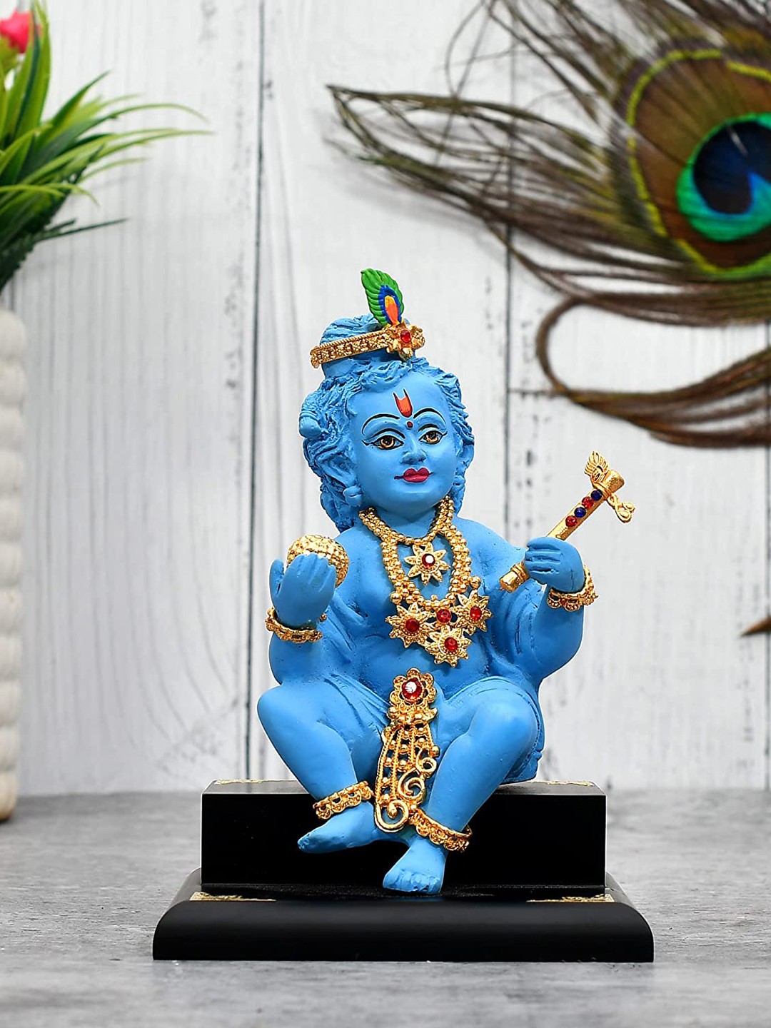 

Perpetual Blue Krishna Idol Showpiece