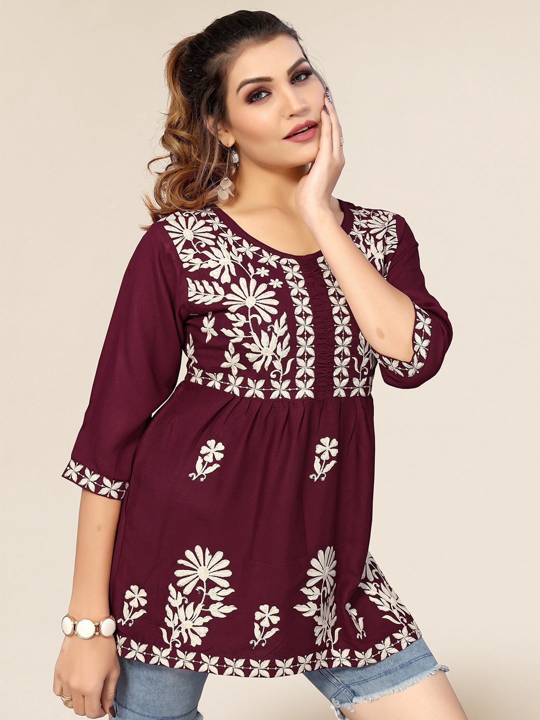 

Winza Designer Women Maroon Floral Embroidered Top