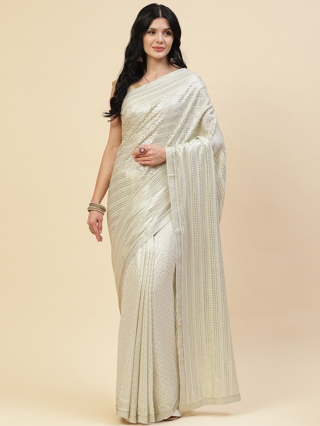 

Meena Bazaar Green Embellished Pure Georgette Saree