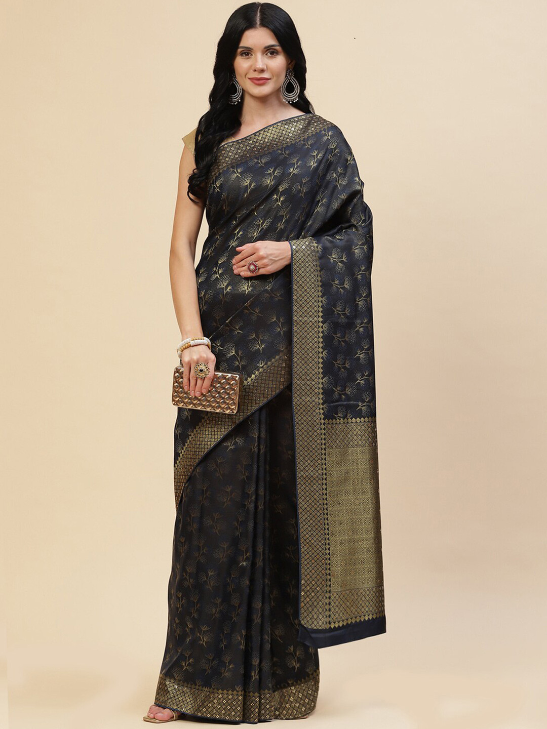 

Meena Bazaar Women Navy Blue & Gold-Toned Floral Zari Silk Blend Saree