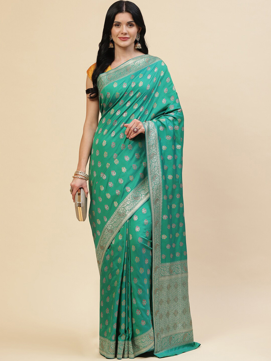 

Meena Bazaar Women Sea Green & Gold-Toned Floral Zari Silk Blend Saree